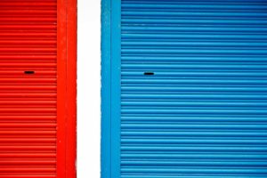 Bright red and blue roller shutters divided