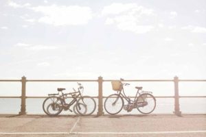 Bikes against beach railings