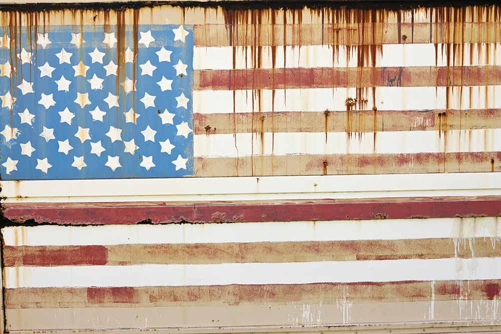 Rusting surface with American Flag painted on it fine art photography