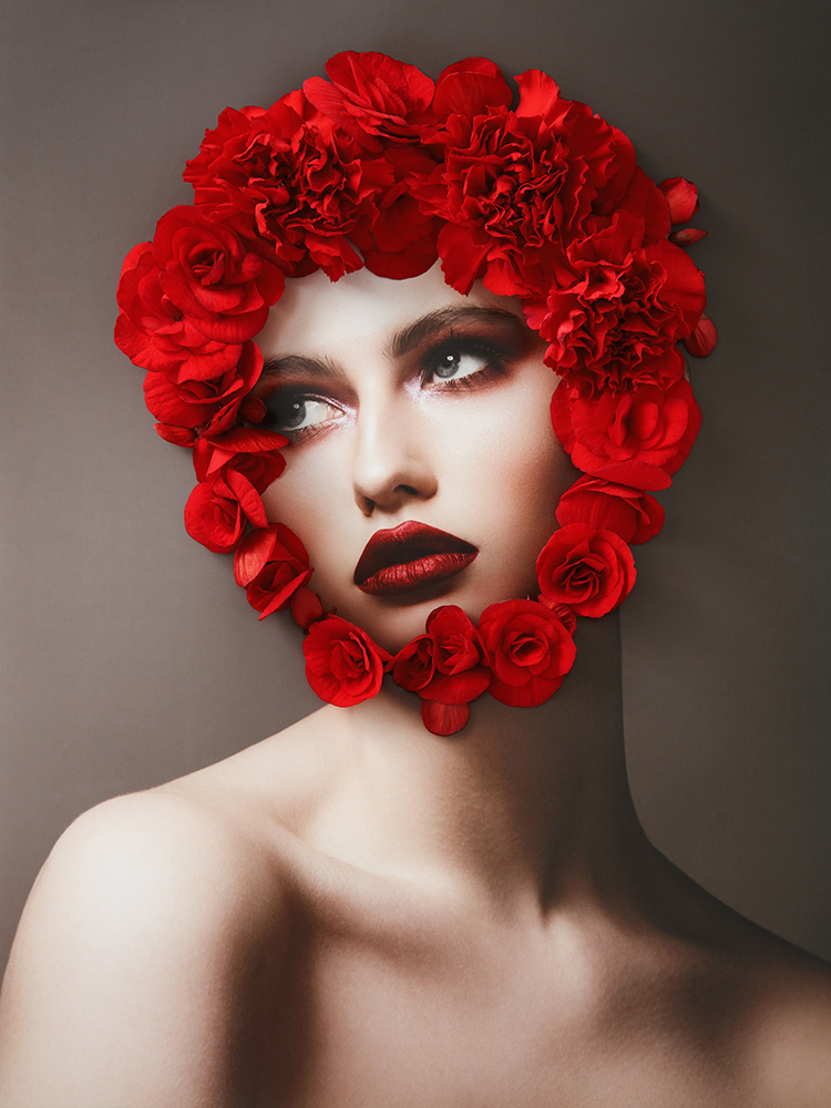 Collage with female portrait and red flowers fine art photography