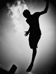 Silhouette Of Person Jumping